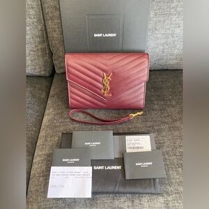 SAINT LAURENT
Monogram Saint Laurent Matelassé Clutch Pouch